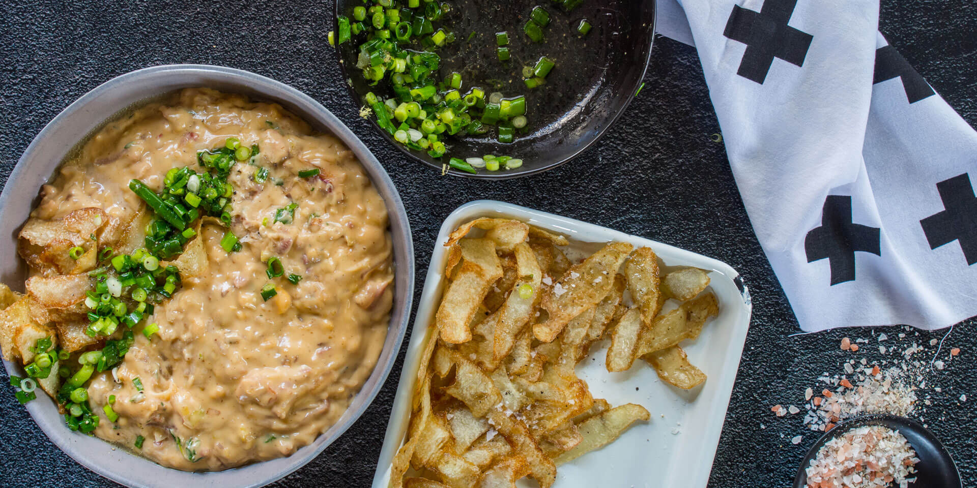 Crispy Potato Skins with Bacon & Cheese Sauce and Spring Onion Salsa