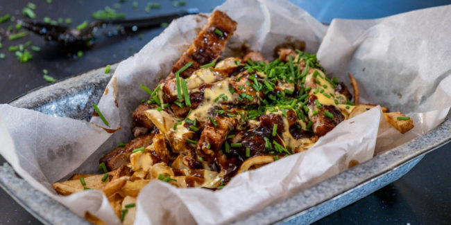 Rib burger potatoes cheese sauce