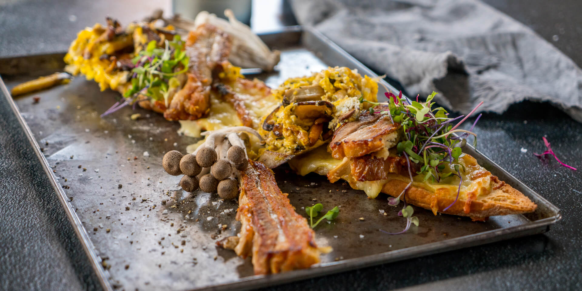 Grilled Cheese Baguette with Wild Mushroom Scrambled Eggs & Roasted Pork Belly
