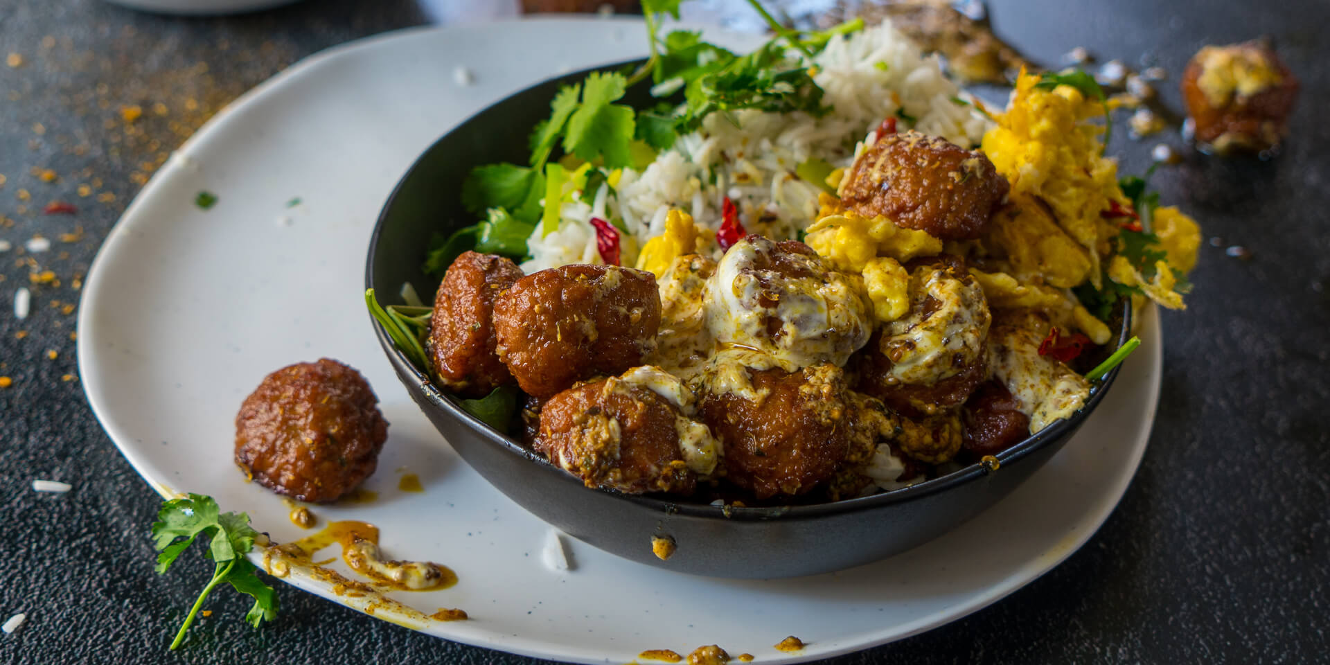 Mini Frikkadel Bobotie Yourt Bobotie Frikkadels in Yoghurt with Chilli Scrambled Eggs on Coriander Rice