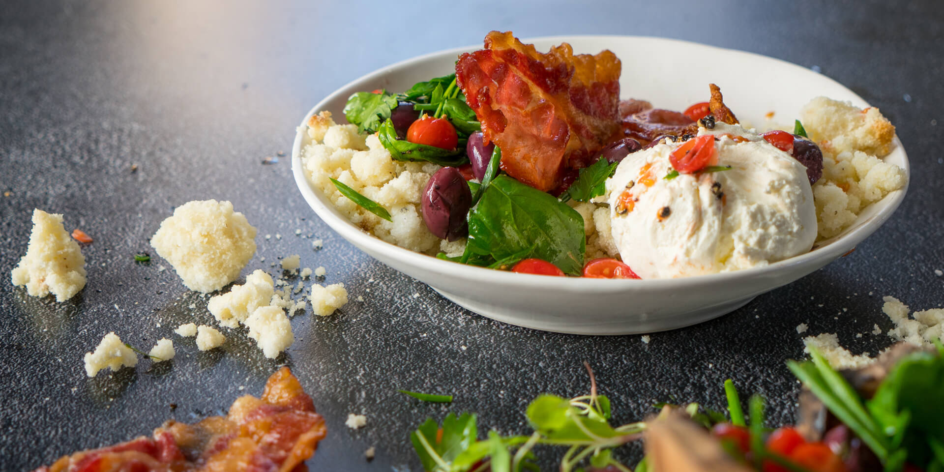 Putu Pap with Tomato & Olive Salsa, Amasi & Crispy Bacon
